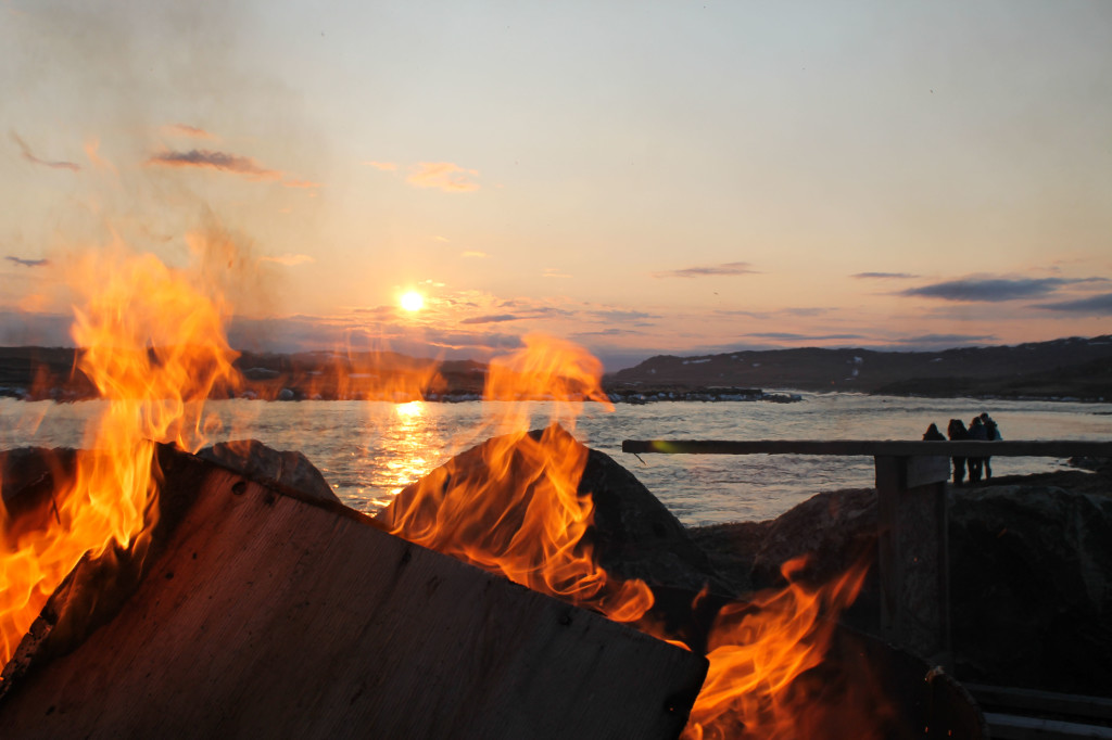 Bonfire blazing before the sun dipped (briefly) below the horizon.